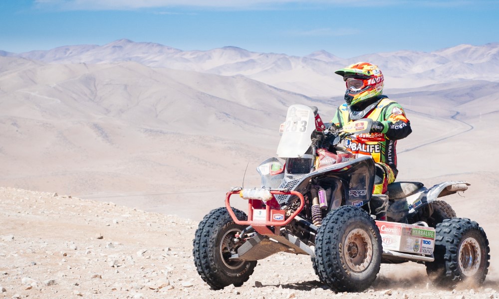 WALTER NOSIGLIA (BOL) op een quad in de Atacama woestijn in Chili tijdens de Dakar Rally in 2015